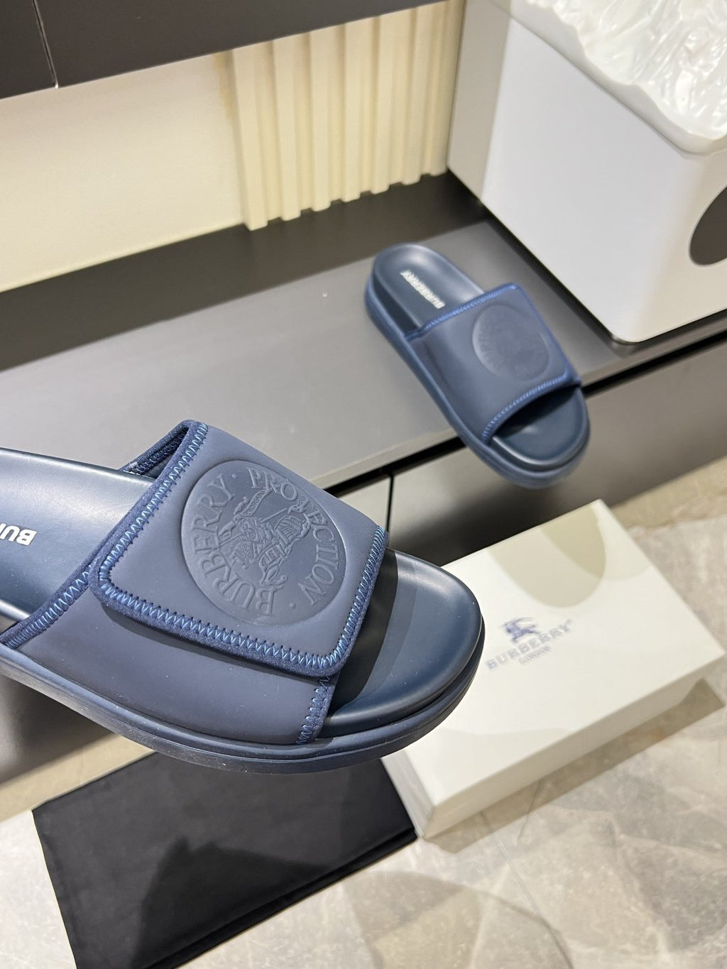 Burberry Embossed Check Slide Sandals — detail