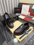 Prada Triangle Plaque Loafers — hero