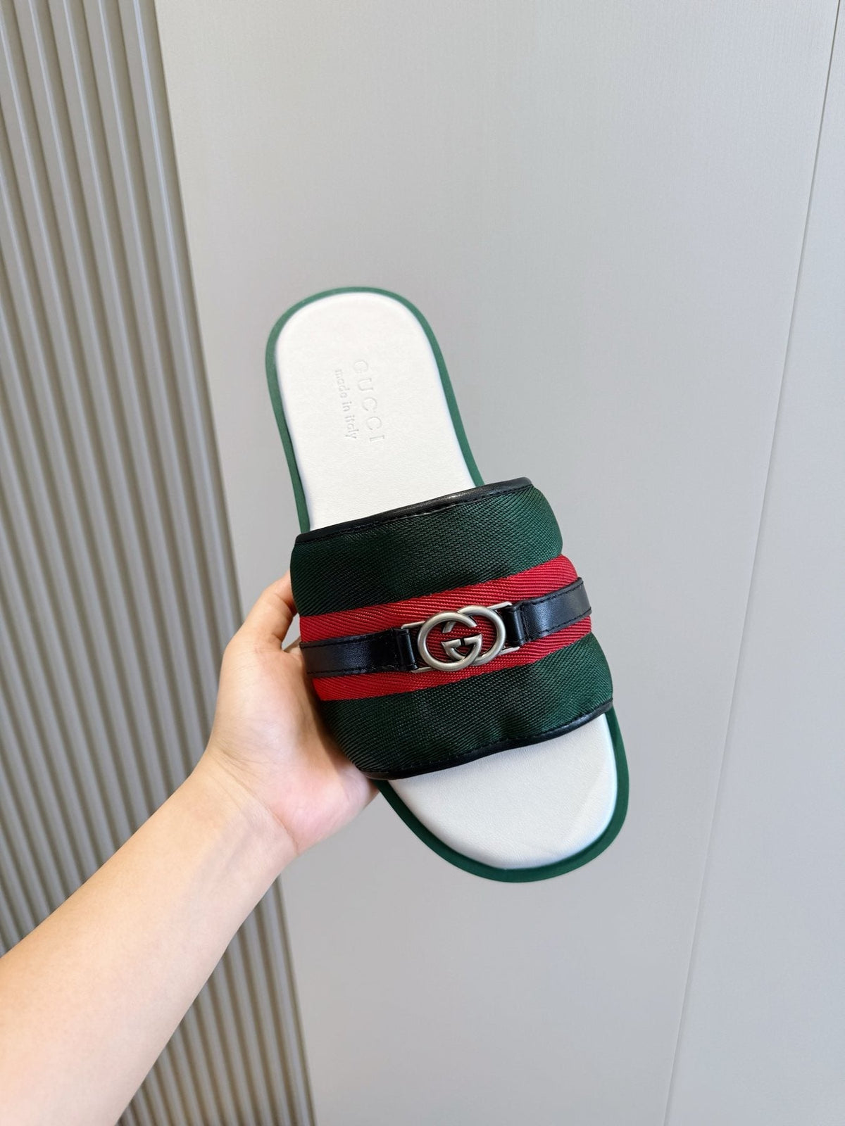 Gucci Interlocking G Stripe Slide Sandals — model